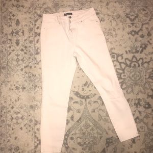 Blush pink skinny jeans